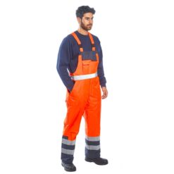 Spodnie Ogrodniczki Ostrzegawcze Portwest S489 Ocieplane 2 kolory do pracy bhp odzież robocza ocieplana zimowa jesienna szwedy odblaskowe na szelkach pomarańczowe model przód