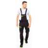Ogrodniczki robocze PORTWEST DX441 szwedy szwedzkie z szelkami na szelkach streczowe stretchowe rozciągliwe wygodne duża swoboda ruchów dx4 dla pracowników odzież robocza premium bhp sklep system internetowy dopasowane nowoczesne czarne na modelu