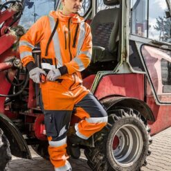 Spodnie Ostrzegawcze Softshell NEO TOOLS 81-751 do pracy ochronne robocze w pas do pasa wodoodporne przeciwdeszczowe ciepłe polarowe wygodne wysokiej widoczności dla drogowców bhp sklep system internetowy dla pracowników pasy odblaskowe pomarańczowe granatowe na modelu