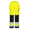 Spodnie ostrzegawcze PORTWEST PW242 do pracy dla drogowców żarówiaste dla pracowników odzież ochronna wytrzymała z odblaskami do pasa w pas z kieszeniami monterskimi system bhp żółte czarne tył